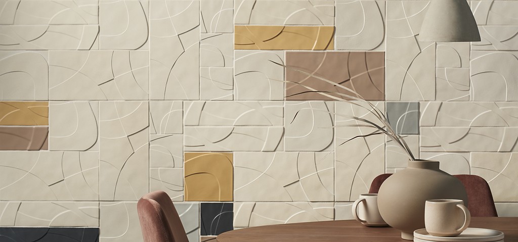 A mosaic wall made of Kohler WasteLAB's Abstra Collection sustainable tiles