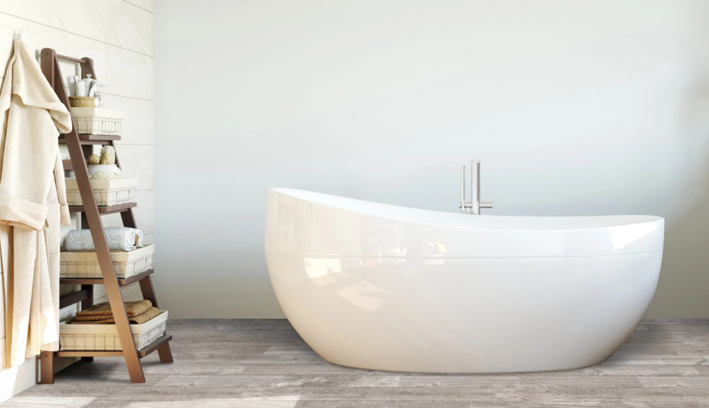 A bathtub on top of a new wood tile floor from Floor and Decor