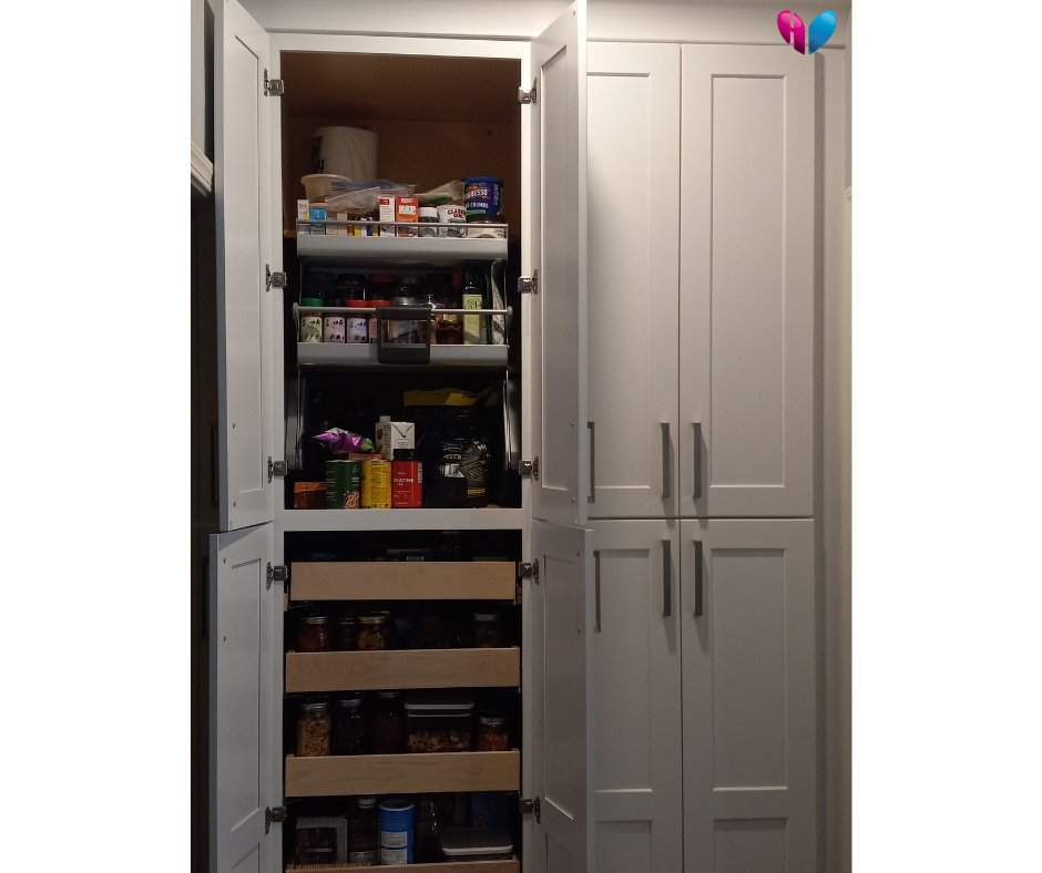 Vertical image of the Terrace pantry remodel, with four cabinet doors on the left open to reveal custom shelving