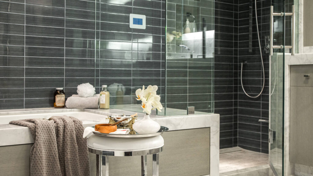 A bathroom following the at-home-spa remodeling trend, complete with a steam shower panel